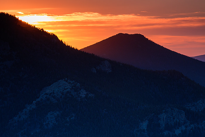 A muted sunrise illuminates the skies over Dark Mountain and Lumpy Ridge. I was able to photograph this view of Rocky from Rainbow Curve along Trail Ridge Road which is now open for the season. Technicial Details: Canon EOS 5D Mark III, 70-300mm F4-5.6 L 