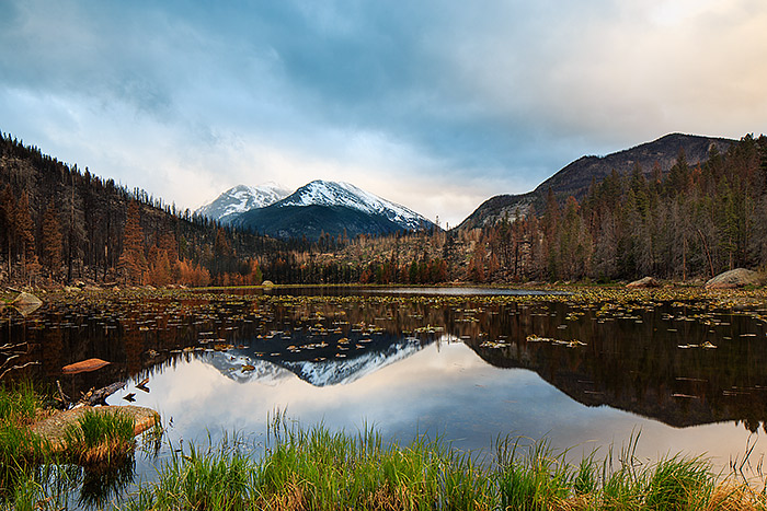 Sunrise at Cub Lake. This was my first visit to photograph Cub Lake after the Fern Lake Fire. The scenery has changed since the fire but Cub Lake remain a place of beauty. Even in destruction, beauty remains in nature. Technicial Details: Canon EOS 5D Mark III, 24mm TS-E F3.5 L II