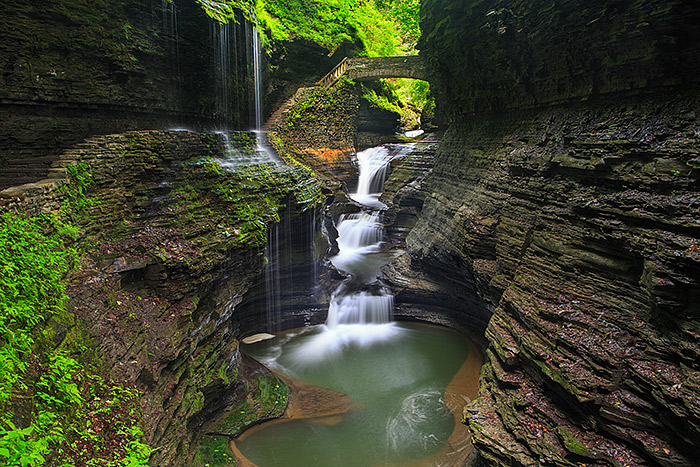 Watkins Glen is one of my personal favorite locations when photographing the Finger Lake regions of New York. Waterfalls abound in the Glen and the possibilities for photographers are endless. Rainbow Falls area is an iconic location in Watkins Glen for obvious reasons. Photographing in Watkins Glen is quite different from the normally arid locations I used to photographing out west. Technical Details: Canon EOS 5D Mark III, 24-105mm F4 IS L  