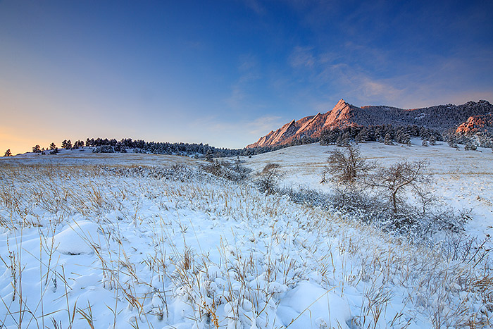 A bone chilling sunrise unfolds over Boulder, Colorado and the Flatirons from Chautauqua Park. It was -9 degrees Fahrenheit in the meadow this morning which made it difficult enough just to work my camera. Technical Details: Canon EOS 5D Mark III, 17mm TS-E F4 L 