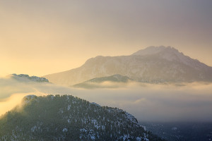 On Saturday, the snow and inversion waffled around 7500 ft or so moving above and below the town of Estes Park. Here the Twin Sisters peak their head above the clouds as the early morning sky lights up over Rocky Mountain National Park. Technical Details: Canon EOS 5D Mark III, 70-300mm F4-5.6 IS L 