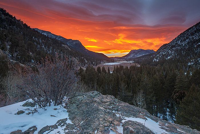 A large wave cloud has formed over the eastern section of Rocky Mountain National Park. With sunrise on the way, this lenticular cloud put on a spectacular light show over Horseshoe Park and Deer Mountain. Wind caused the wave cloud to form over the foothills, but without the pesky windy conditions, a colorful sunrise like this one would not have been possible. Technical Details: Canon EOS 1Ds III, 24mm TS-E F3.5 L II