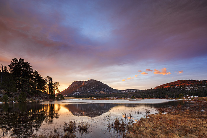 Deer Mountain reflects in the mostly placid waters of Sheep Lakes. The rising sun illuminates the side of Deer Mountain and the skies over Horseshoe Park. Technical Details: Canon 5D Mark III, 24mm TS-E F3.5 L II