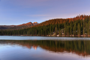 Wind was raking the surface of Bear Lake. Ideally I would have liked to include more of Longs Peak in the photo. Only the western portion of the lake was smooth enough to capture a reflection so I had to compromise on my location. Technical Details: Canon EOS 5D Mark III,24-70mm F4 IS L 