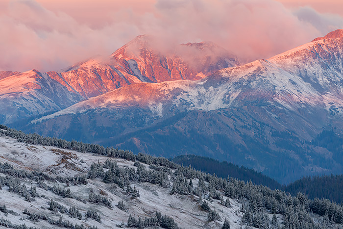 Storm clouds roll off the high peaks of the aptly named Never Summer Range in Rocky Mountain National Park. The calendar says its August 19th, but the conditions in Rocky this morning appear more winter like. While it can snow at anytime in Rocky Mountain National Park, this is the earliest I've been able to photograph a healthy dusting of snow on the high peaks. Technical Details: Nikon D810, Sigma C150-600mm F5.6-6.3 DG OS HSM lens.