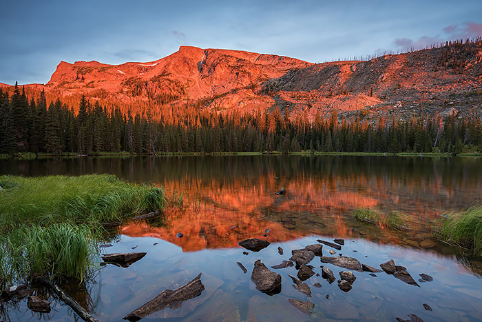 This time of year one has many options when photographing in Rocky Mountain National Park. With the seasons transitioning from summer to fall one can chose to photograph summer like scenes as well as scenes more representative of autumn. Of course the trick this time of year is doing so before the weather sets in and alters ones plans. Last week I was able to photograph this summer like sunrise at Ouzel Lake in Wild Basin, while at the same time photographing some early fall color as well. Technical Details: Nikon D810, Nikkor 16-35mm F4 ED VR lens