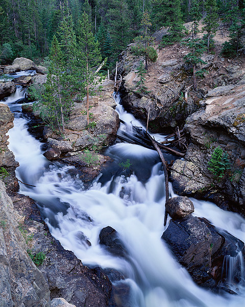 Adams Falls tumbles towards the Colorado River on the west side of Rocky Mountain National Park near Grand Lake. Adams Falls...