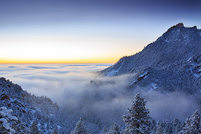 A cold air inversion has caused clouds, fog and snow to settle over Boulder Valley. The inversion is not deep enough to encompass...