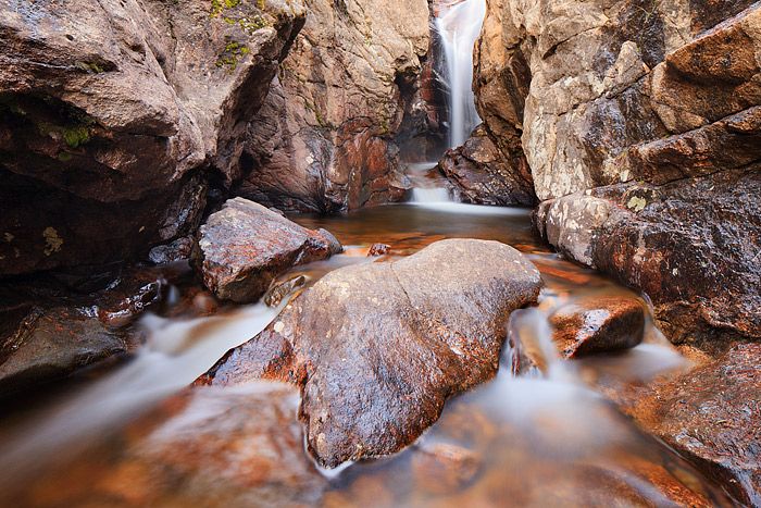 Fall River flows through the granite chamber that makes up Rocky Mountain National Parks Chasm Falls. Chasm Falls located near...