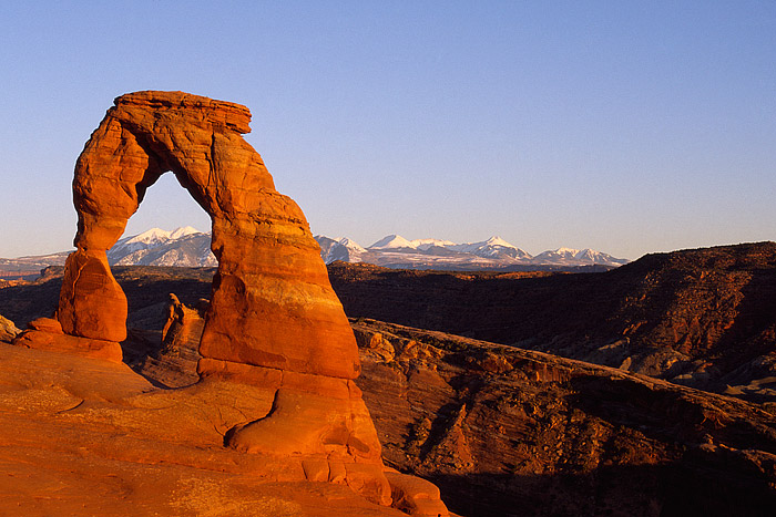 Delicate Arch frames Mt. Werner and the La Sal Mountains from Arches National Park. Delicate Arch is probably one of the most...
