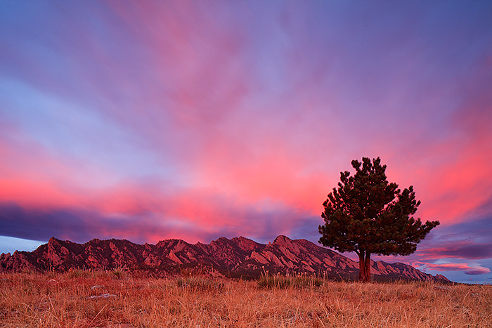 An almost otherworldy sunrise unfolds over the Boulder Flatirons as photographed from the Doudy Draw area. A&nbsp;Ponderosa&nbsp...