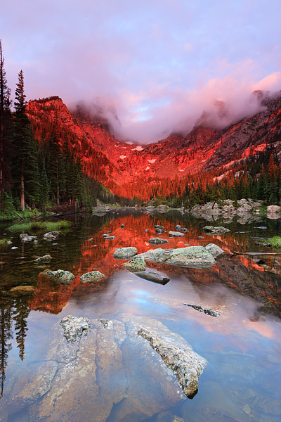 First light at Dream Lake reveals a dranatic scene over Hallet Peak as a storm from the previous night clear out just enought...
