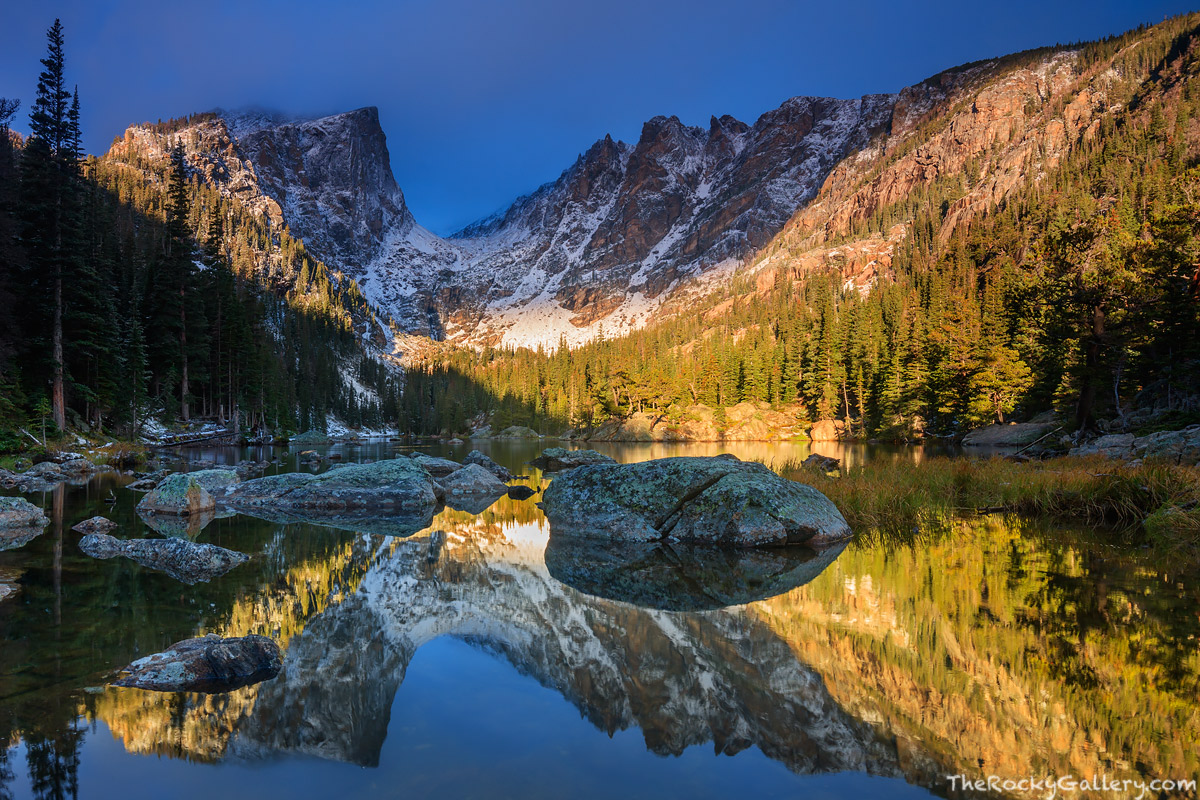Catching a combination of dramatic lighting combined with no wind at Dream Lake can be very difficult. Every season photographers...