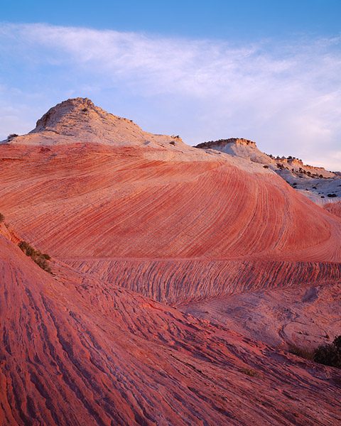 Sunrise in Escalante National Monument. These sandstone swirls are located near Hole in the Rock road just outside the town of...