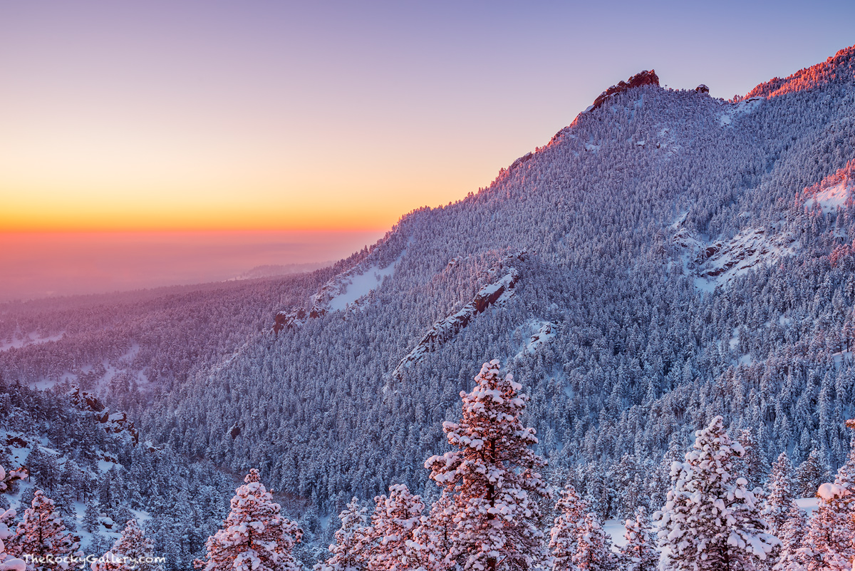 The snows that blanketed the Flatirons of Boulder,Colorado have moved out overnight leaving only a powdery layer of fresh snow...