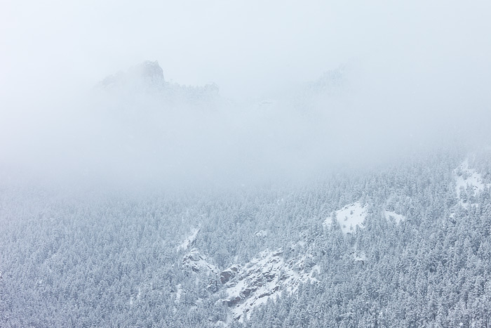 Heavy snow is falling on the Flatirons and the town of Boulder in this view from Flagstaff Mountain just west of downtown. The...