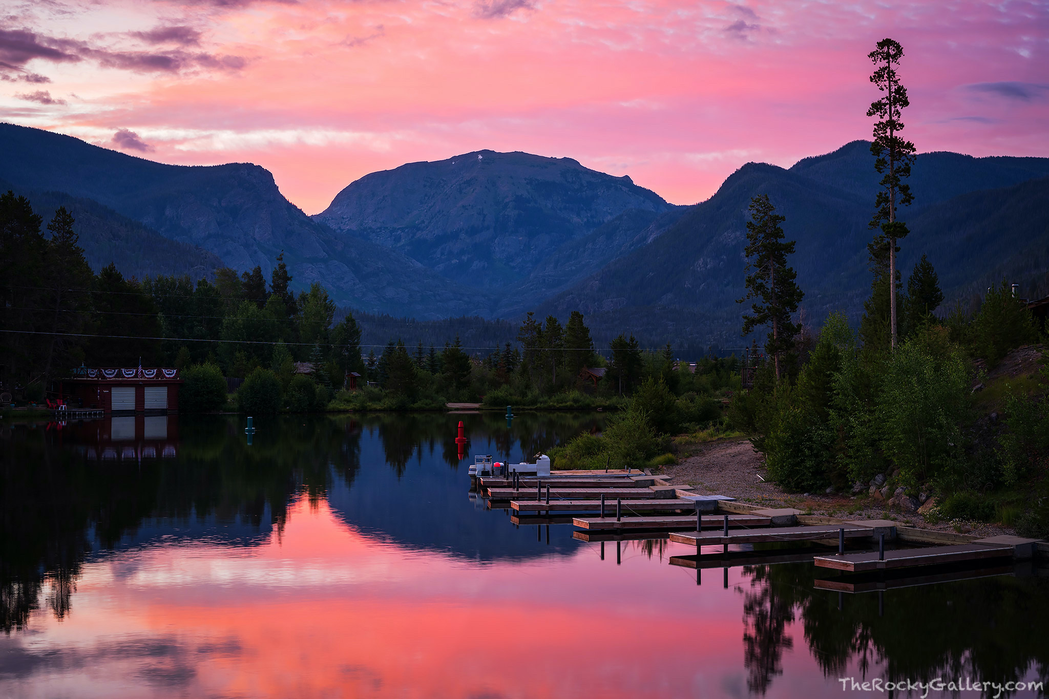 A beautiful sunrise unfolds over the calm channel waters between Grand Lake and Shadow Mountain Resevoir. With the East Inlet...