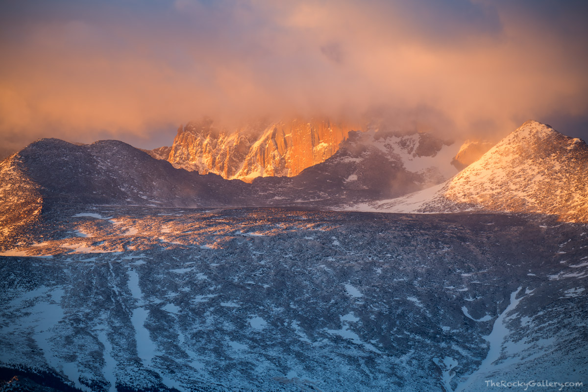 It's a cool March morning in Rocky Mountain National Park. Clouds that obscure the 14,259 ft summit of Longs Peak breifly make...
