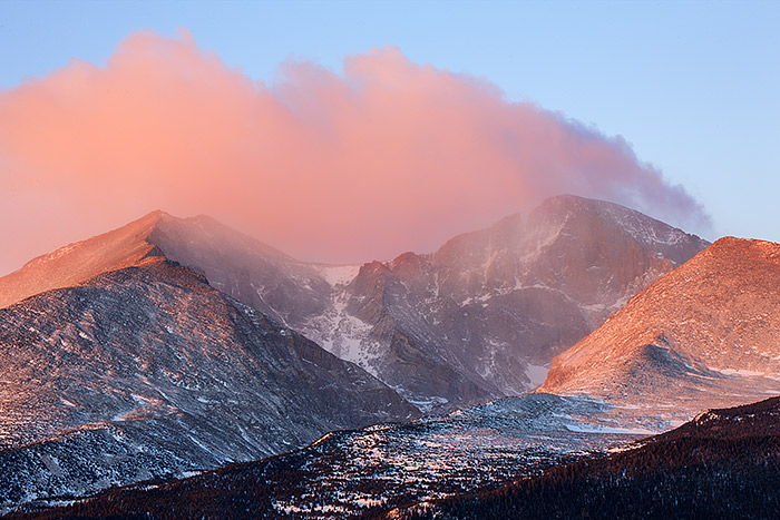 Strong northerly winds rake over the summit of Longs Peak and Mount Meeker in this winter view of the two tallest peaks in Rocky...