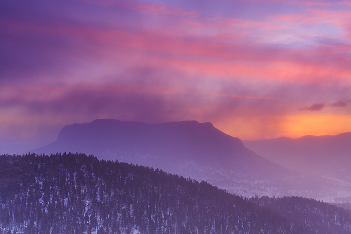 A colorful winter&nbsp;sunrise unfolds in the skies over Deer Mountain and RockyMountain National Park. Though the colors of...