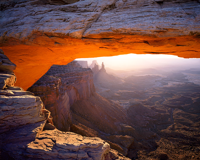 Mesa Arch at sunrise. This iconic spot is a favorite of photographers for obvious reasons. When the sun rises above Utah's La...