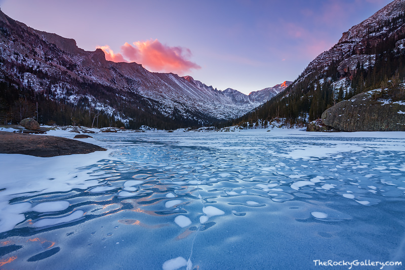 It's a chilly morning at the lake that bears the name of the man known as the 'Father of Rocky Mountain National Park'. Clouds...