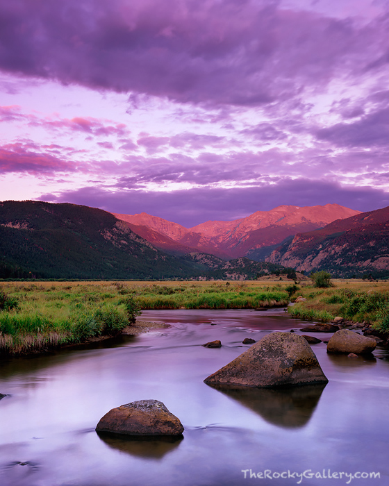 Sunrise illuminates Moraine Park and Stones Peak along the Big Thompson river. Some of the best area to view sunrises in Rocky...