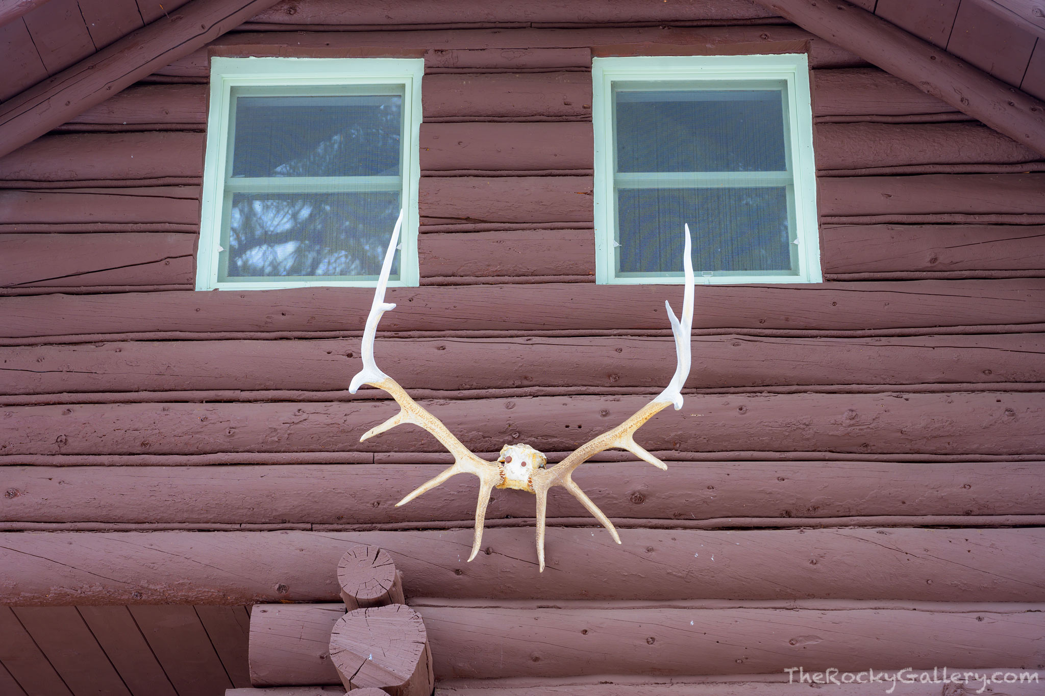 A ranger cabin near the east entrance to Rocky Mountain National Park displays some Colorado mountain decor. Antlers from an...