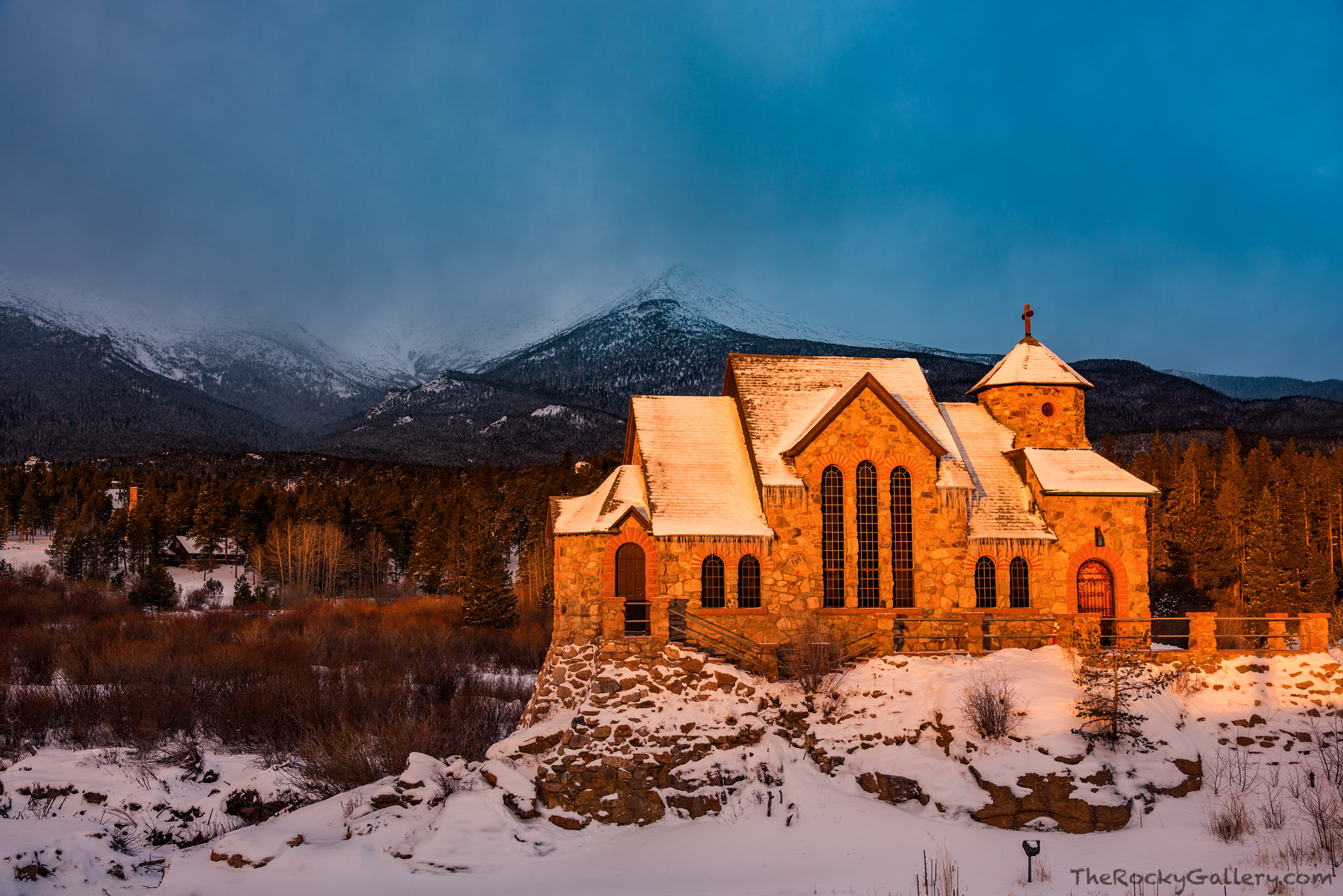 It's Christmas Eve morning at Saint Catherines Chapel on the Rock just outside of Rocky Mountain National Park. Snow fell overnight...