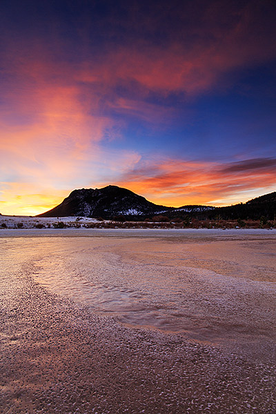 A kaleidoscope of color envelops the sky over Horseshoe Park and Sheep Lake in Rocky Mountain National Park. The winter winds...