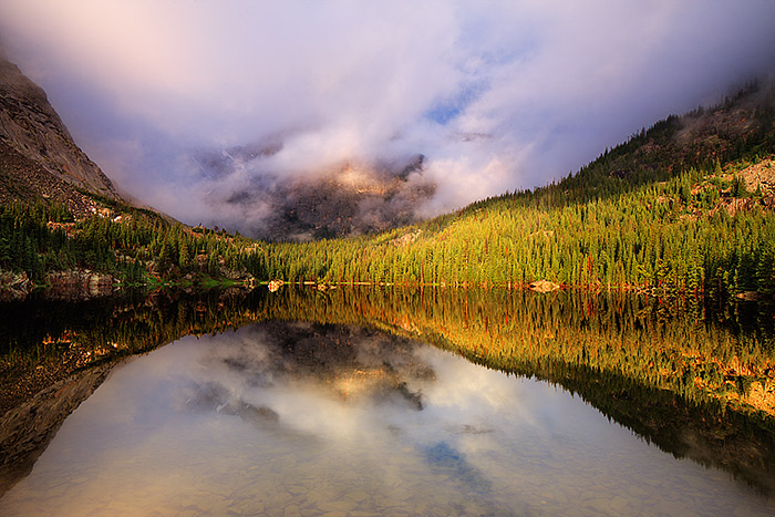 Heavy rains fell all through the night over Loch Vale in Rocky Mountain National Park. The weather calmed, the rain stopped and...