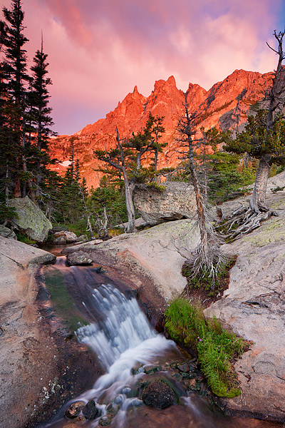 Tyndall Creek glides downstream towards Dream Lake. Clouds glide over the summit of Flattop Mountain on this beautiful morning...