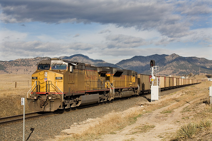 A Union Pacific train loaded with western Colorado coal heads eastbound at Leyden. While still headed downgrade towards Denver...