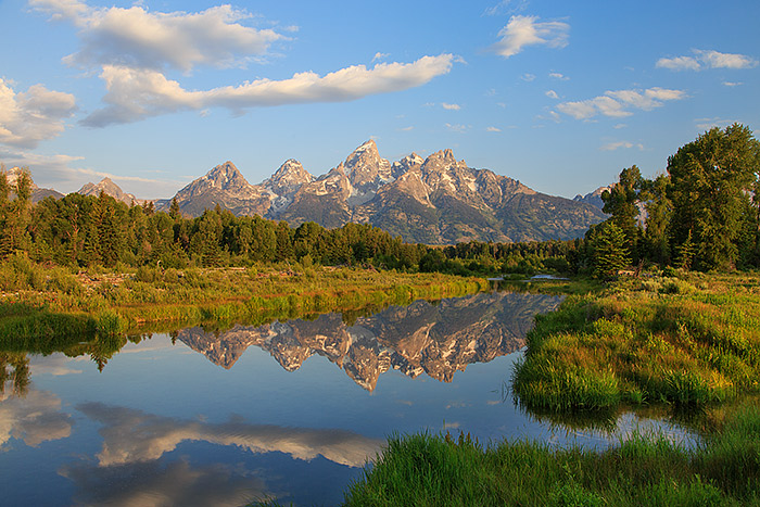 Clouds drift over the high peaks of Teton range while the Snake River reflects this glorious Wyoming morning. This was a perfect...